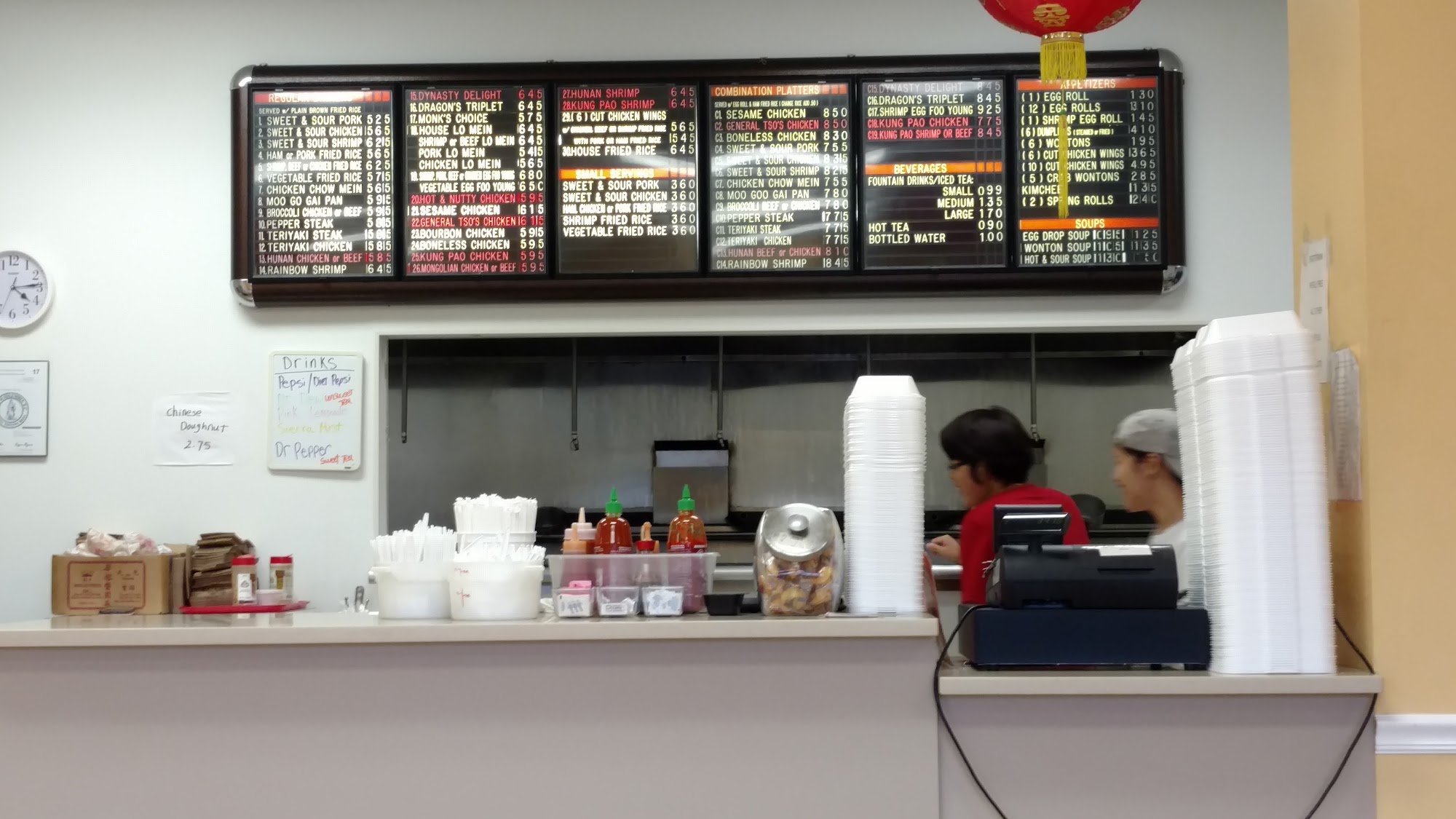 Egg Roll Express menu cover with dragon logo